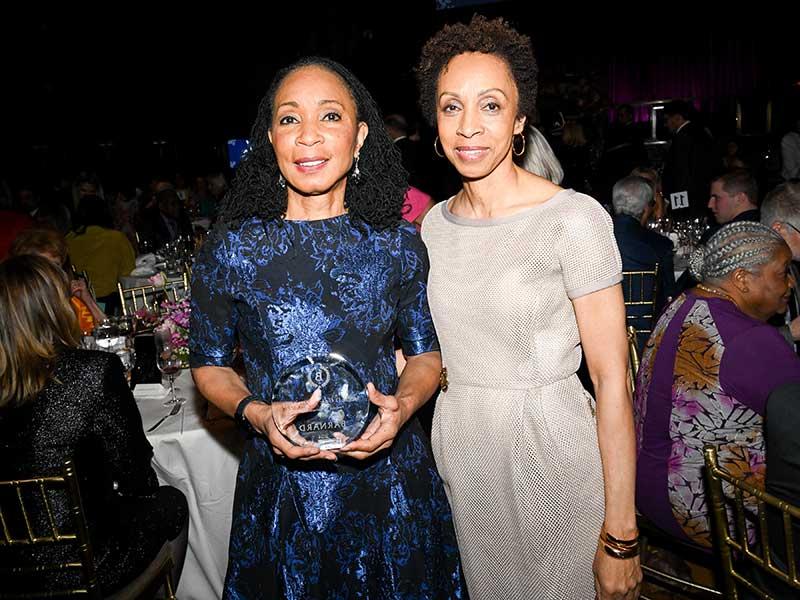 Trustee Nina Shaw ’76stands beside Honoree Dr. Helene D. Gayle ’76